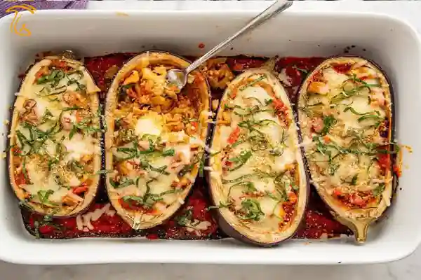 غذا بادمجان و قارچ و پنیر پیتزا طرز تهیه بادمجان شکم پر با قارچ و پنیر پیتزا